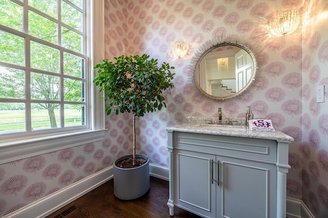 4791 Yantis Dr, New Albany, OH 43054 - bathroom featuring wallpapered walls, wood finished floors, and vanity