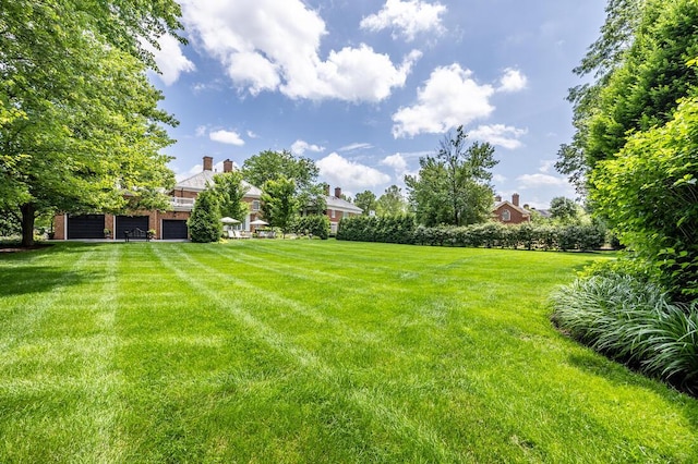 4791 Yantis Dr, New Albany, OH 43054 - view of green lawn featuring a garage