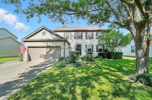 3383 Parkbrook Dr, Grove City, OH 43123 - colonial house featuring an attached garage, concrete driveway, and a front lawn