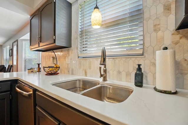 3383 Parkbrook Dr, Grove City, OH 43123 - kitchen featuring tasteful backsplash, light countertops, hanging light fixtures, and stainless steel dishwasher