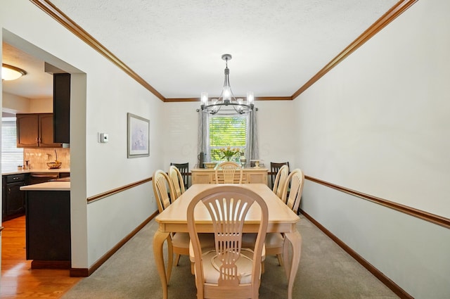 3383 Parkbrook Dr, Grove City, OH 43123 - dining space featuring a chandelier and ornamental molding