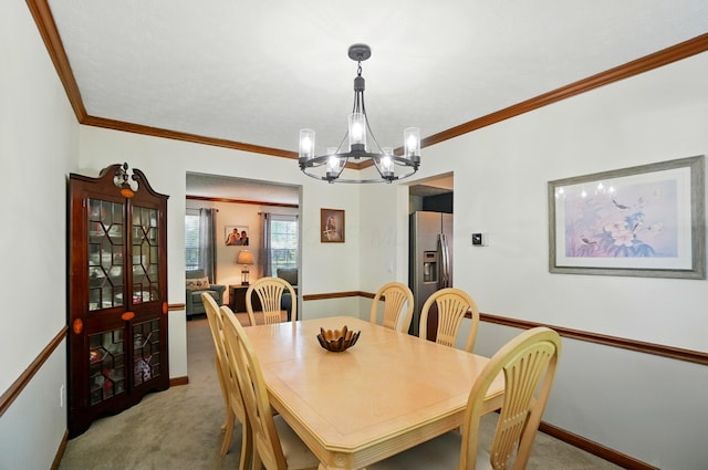 3383 Parkbrook Dr, Grove City, OH 43123 - dining room with a chandelier, light carpet, and ornamental molding
