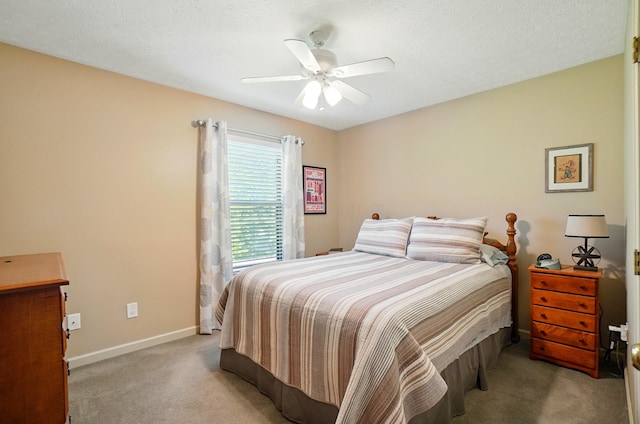 3383 Parkbrook Dr, Grove City, OH 43123 - bedroom with light carpet, a ceiling fan, and a textured ceiling