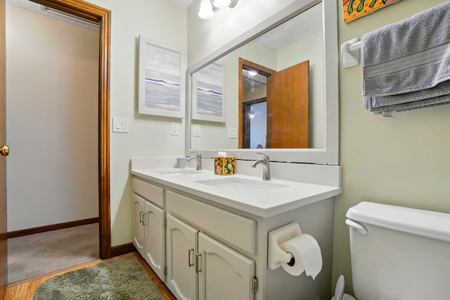 3383 Parkbrook Dr, Grove City, OH 43123 - bathroom with double vanity and wood finished floors