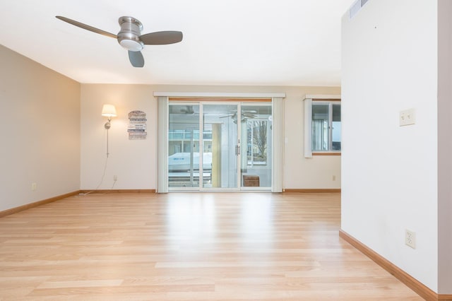 129 Chase Ave Unit 102L, Russells Point, OH 43348 - spare room featuring light wood-style floors and a ceiling fan
