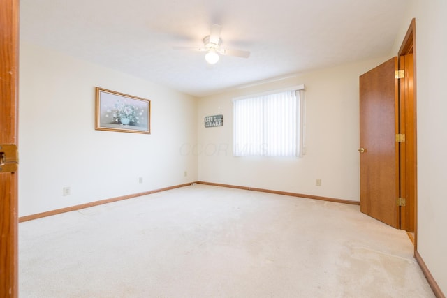 129 Chase Ave Unit 102L, Russells Point, OH 43348 - unfurnished room with a ceiling fan and light colored carpet