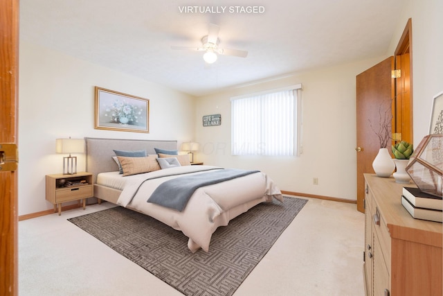 129 Chase Ave Unit 102L, Russells Point, OH 43348 - bedroom with light carpet and ceiling fan