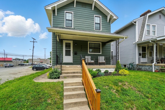 484 Sheldon Ave, Columbus, OH 43207 - view of front of home featuring a porch and a front lawn