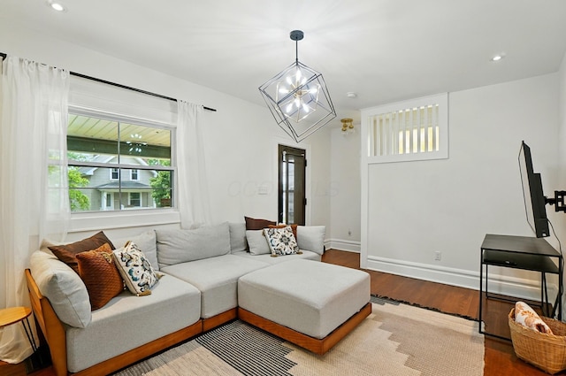 484 Sheldon Ave, Columbus, OH 43207 - living room with a chandelier, wood finished floors, and recessed lighting
