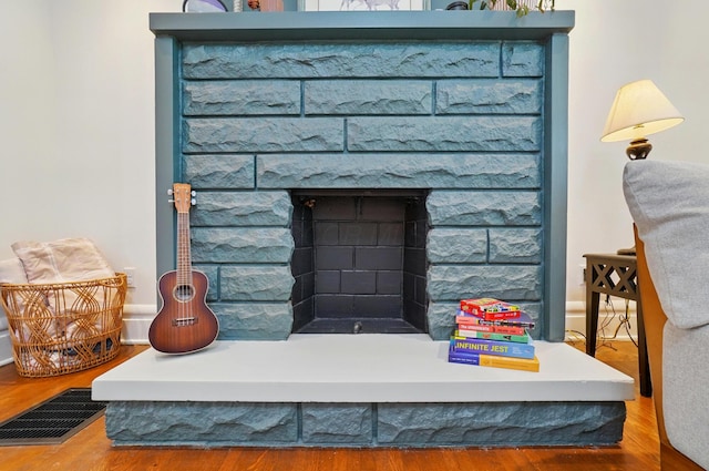 484 Sheldon Ave, Columbus, OH 43207 - detailed view of a fireplace and wood finished floors