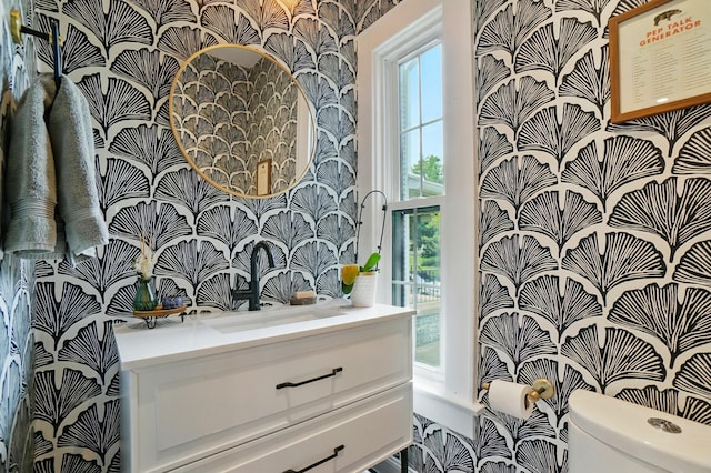 484 Sheldon Ave, Columbus, OH 43207 - half bathroom with wallpapered walls and vanity