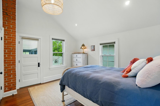 484 Sheldon Ave, Columbus, OH 43207 - bedroom with wood finished floors, vaulted ceiling, and recessed lighting