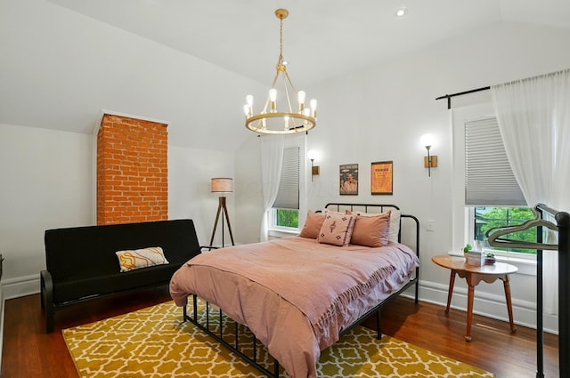 484 Sheldon Ave, Columbus, OH 43207 - bedroom with lofted ceiling, a chandelier, wood finished floors, multiple windows, and recessed lighting