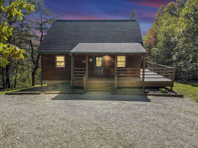 35640 Vickers Rd, Logan, OH 43138 - chalet / cabin featuring a shingled roof and covered porch