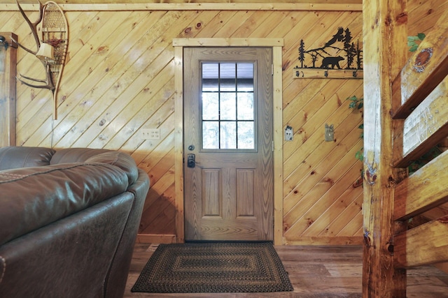 35640 Vickers Rd, Logan, OH 43138 - doorway to outside with wooden walls and wood finished floors