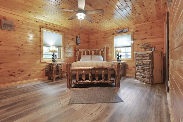 35640 Vickers Rd, Logan, OH 43138 - bedroom with wood finished floors and wood walls