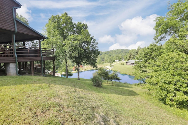 35640 Vickers Rd, Logan, OH 43138 - view of grassy yard featuring a deck with water view