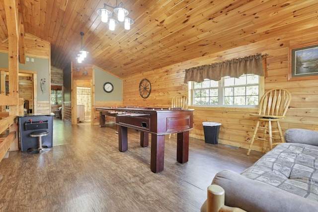 35640 Vickers Rd, Logan, OH 43138 - game room with lofted ceiling, wooden walls, and wood finished floors