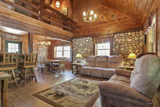 35640 Vickers Rd, Logan, OH 43138 - living room featuring a chandelier, high vaulted ceiling, wooden ceiling, plenty of natural light, and wood walls