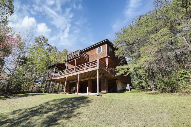 35640 Vickers Rd, Logan, OH 43138 - back of property featuring a wooden deck and a yard
