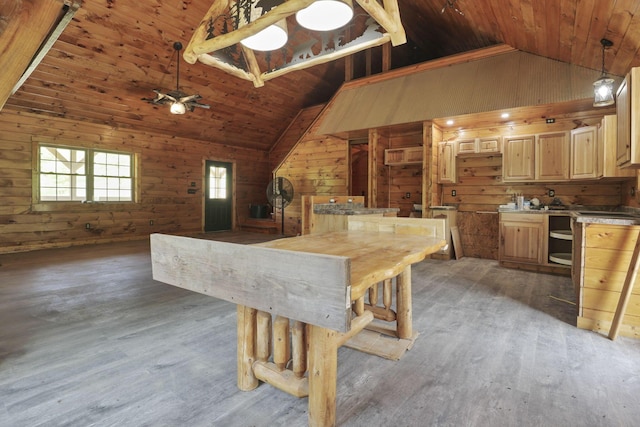 35640 Vickers Rd, Logan, OH 43138 - kitchen featuring wooden walls, light brown cabinets, light wood-type flooring, wood ceiling, and high vaulted ceiling