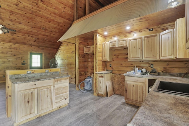 35640 Vickers Rd, Logan, OH 43138 - kitchen with wooden walls, light brown cabinets, light wood finished floors, wood ceiling, and high vaulted ceiling