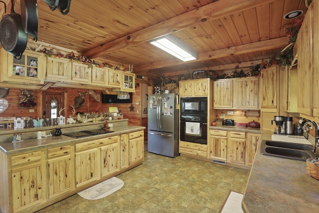 35640 Vickers Rd, Logan, OH 43138 - kitchen featuring black appliances, a wooden ceiling with exposed beams, glass insert cabinets, wooden walls, and light countertops