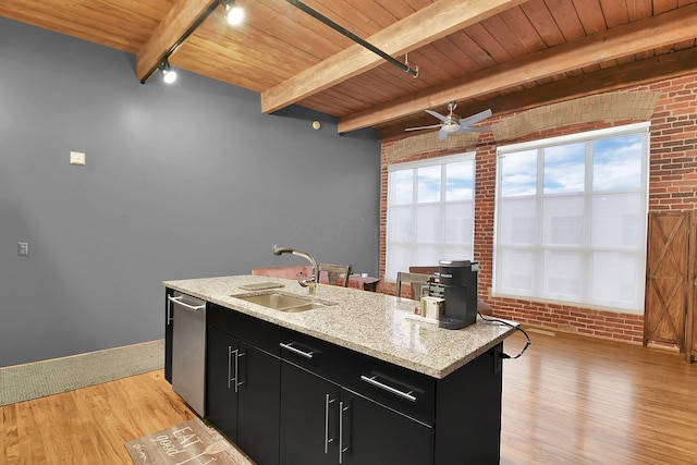 448 W Nationwide Blvd Unit 404, Columbus, OH 43215 - kitchen featuring dark cabinets, brick wall, a wood ceiling with exposed beams, dishwasher, and light wood finished floors