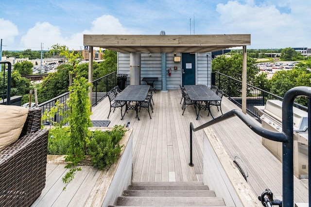 448 W Nationwide Blvd Unit 404, Columbus, OH 43215 - wooden terrace with outdoor dining area