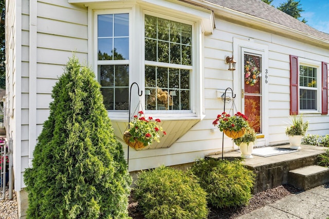 366 E Jeffrey Pl, Columbus, OH 43214 - doorway to property featuring a shingled roof
