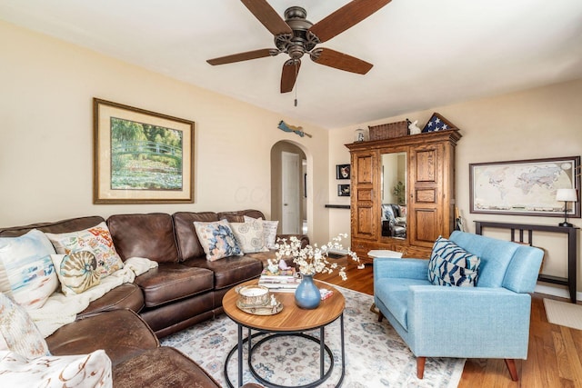 366 E Jeffrey Pl, Columbus, OH 43214 - living area with arched walkways, wood finished floors, and a ceiling fan
