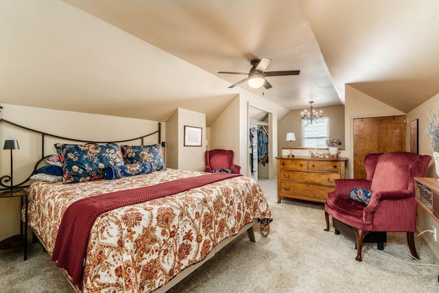 366 E Jeffrey Pl, Columbus, OH 43214 - carpeted bedroom featuring a chandelier, vaulted ceiling, a ceiling fan, and a walk in closet