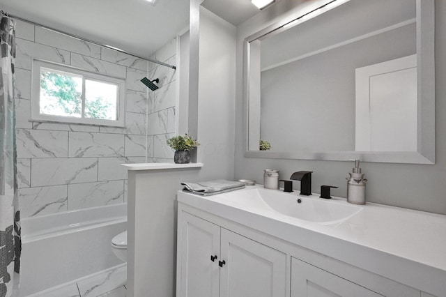 1370 Wiltshire Rd, Columbus, OH 43223 - full bath with marble look tiles, vanity, and shower / tub combo