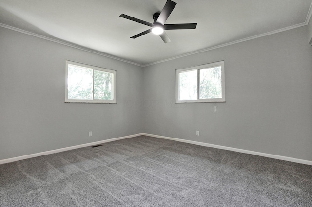 1370 Wiltshire Rd, Columbus, OH 43223 - spare room featuring ornamental molding, healthy amount of natural light, ceiling fan, and carpet floors