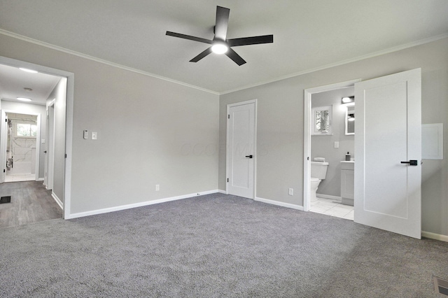 1370 Wiltshire Rd, Columbus, OH 43223 - unfurnished bedroom with carpet floors, ornamental molding, ensuite bathroom, and a ceiling fan