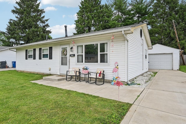 932 Brian Dr, Reynoldsburg, OH 43068 - ranch-style home with a front yard, an outdoor structure, a garage, and concrete driveway