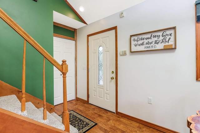 51801 State Route 671, Londonderry, OH 45647 - entrance foyer featuring vaulted ceiling, stairs, and wood finished floors