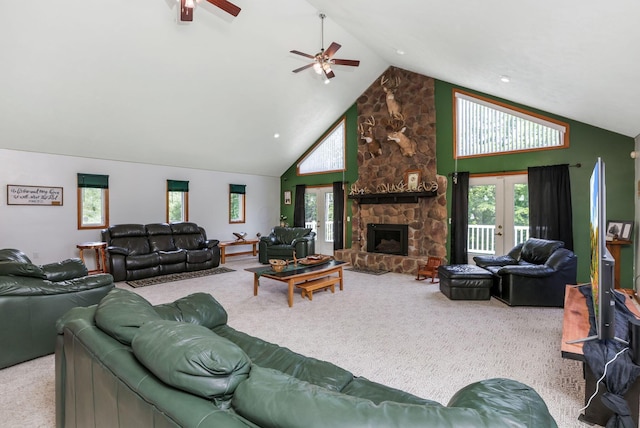 51801 State Route 671, Londonderry, OH 45647 - living room featuring carpet floors, ceiling fan, high vaulted ceiling, french doors, and a fireplace