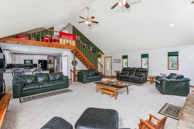 51801 State Route 671, Londonderry, OH 45647 - living room with high vaulted ceiling, a ceiling fan, stairs, and light colored carpet