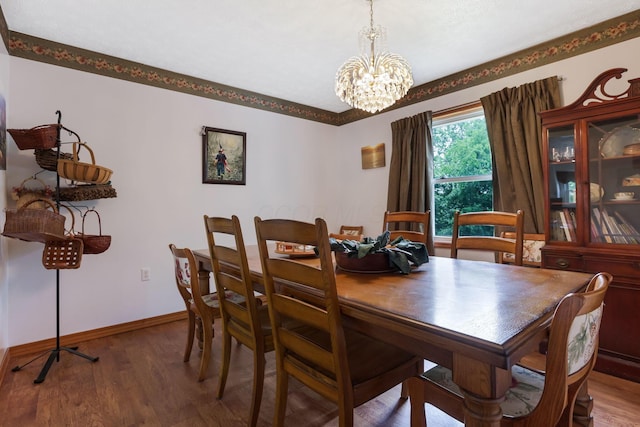 51801 State Route 671, Londonderry, OH 45647 - dining space featuring a chandelier and wood finished floors