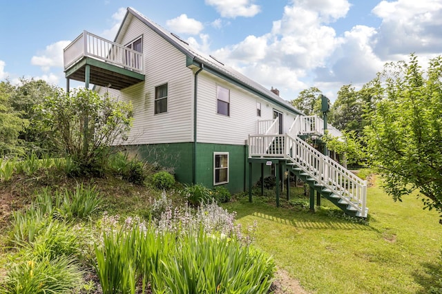 51801 State Route 671, Londonderry, OH 45647 - view of side of property featuring a lawn, stairway, and a deck