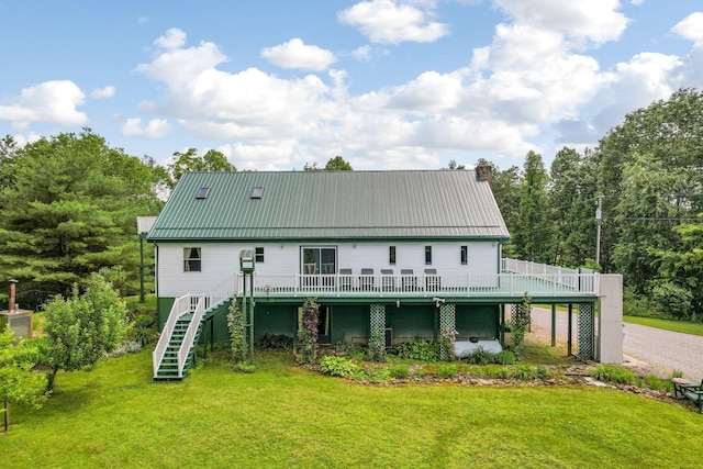 51801 State Route 671, Londonderry, OH 45647 - rear view of property featuring a wooden deck, a lawn, and a metal roof