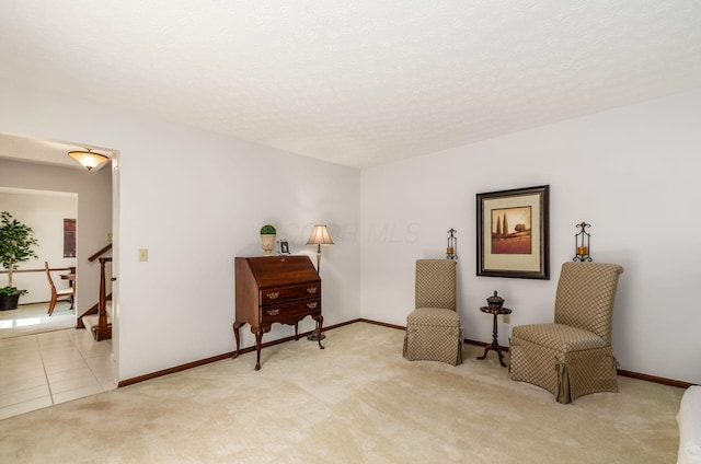 7771 Strathmoore Rd, Dublin, OH 43016 - sitting room with light carpet and stairs