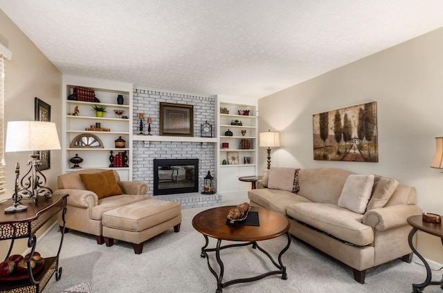 7771 Strathmoore Rd, Dublin, OH 43016 - carpeted living area with a textured ceiling, a fireplace, and built in features