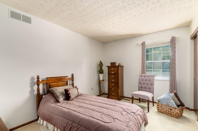 7771 Strathmoore Rd, Dublin, OH 43016 - bedroom featuring carpet and a textured ceiling