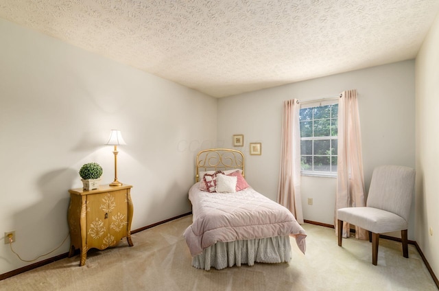 7771 Strathmoore Rd, Dublin, OH 43016 - carpeted bedroom with a textured ceiling and baseboards