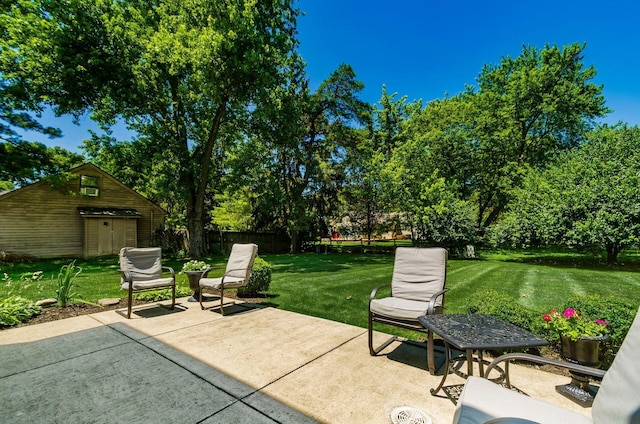 7771 Strathmoore Rd, Dublin, OH 43016 - view of patio / terrace with an outbuilding and view of scattered trees