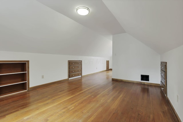 3505 Dresden St, Columbus, OH 43224 - additional living space featuring hardwood / wood-style floors and vaulted ceiling