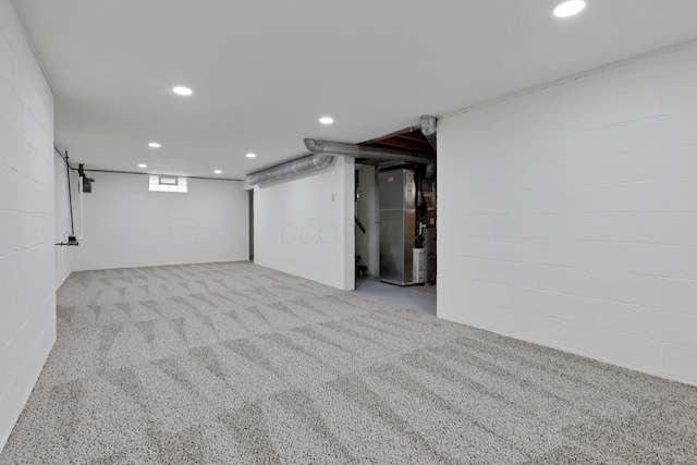 3505 Dresden St, Columbus, OH 43224 - below grade area featuring recessed lighting, carpet flooring, concrete block wall, and heating unit