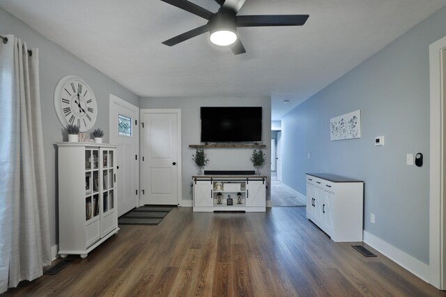 4634 State Route 61, Sunbury, OH 43074 - unfurnished living room featuring a ceiling fan and dark wood finished floors